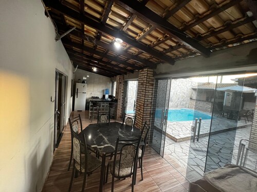 House with swimming pool and barbecue.