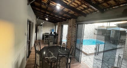 House with swimming pool and barbecue.