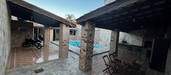 House with swimming pool and barbecue.