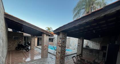 House with swimming pool and barbecue.