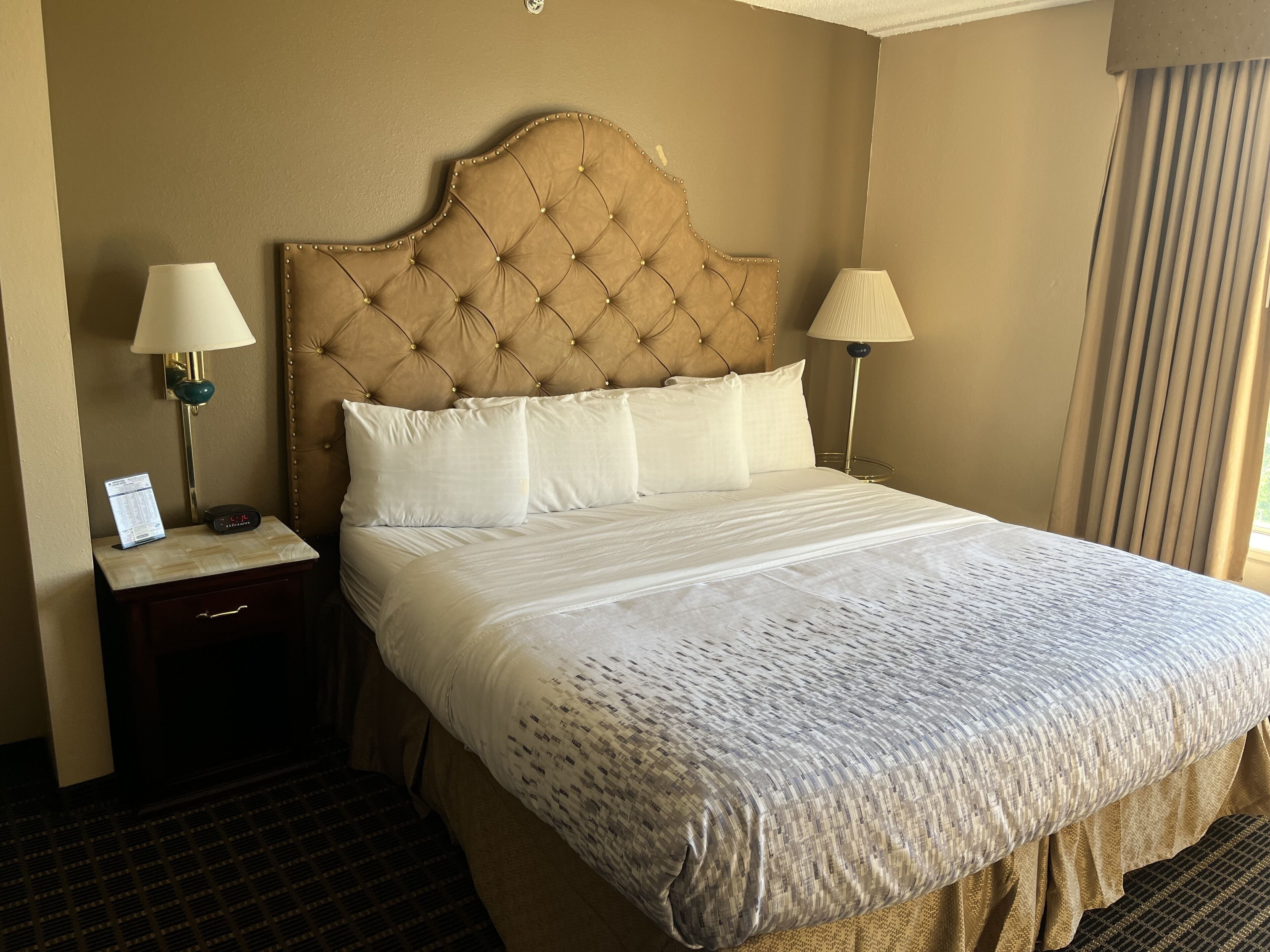 Premium bedding, desk, laptop workspace, soundproofing