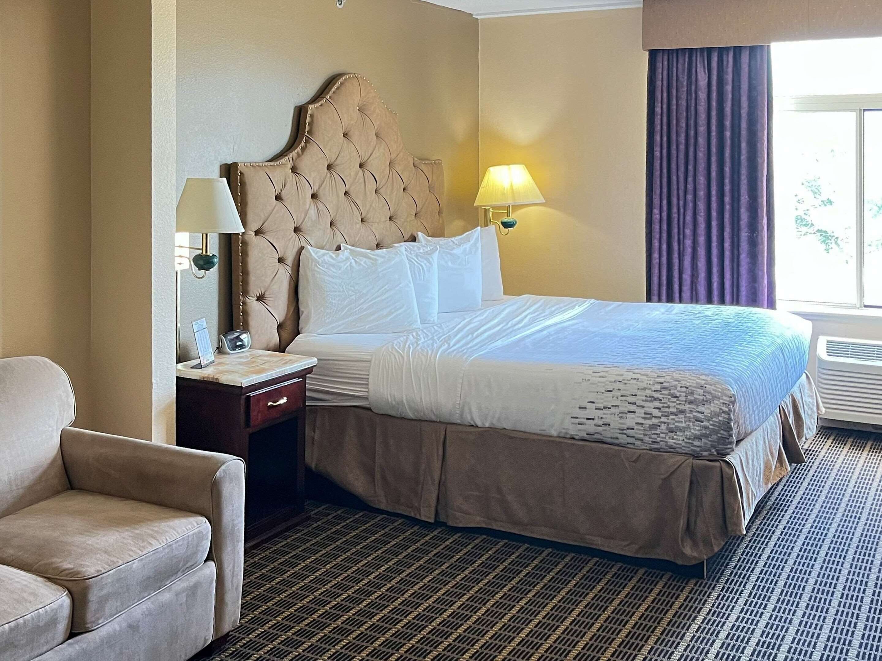 Premium bedding, desk, laptop workspace, soundproofing