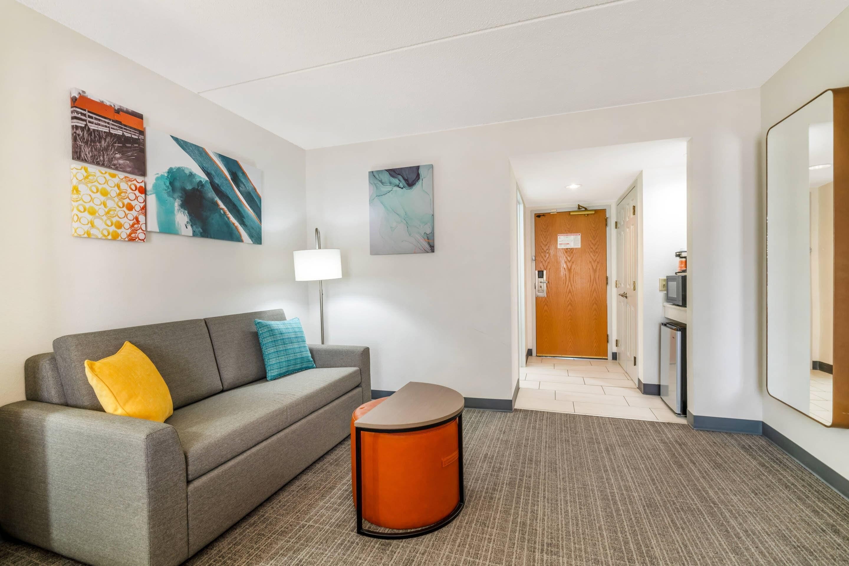 Premium bedding, desk, laptop workspace, soundproofing