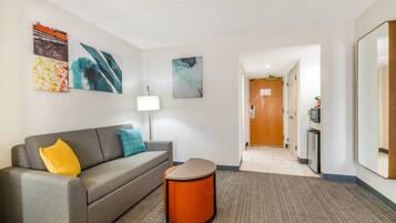 Premium bedding, desk, laptop workspace, soundproofing