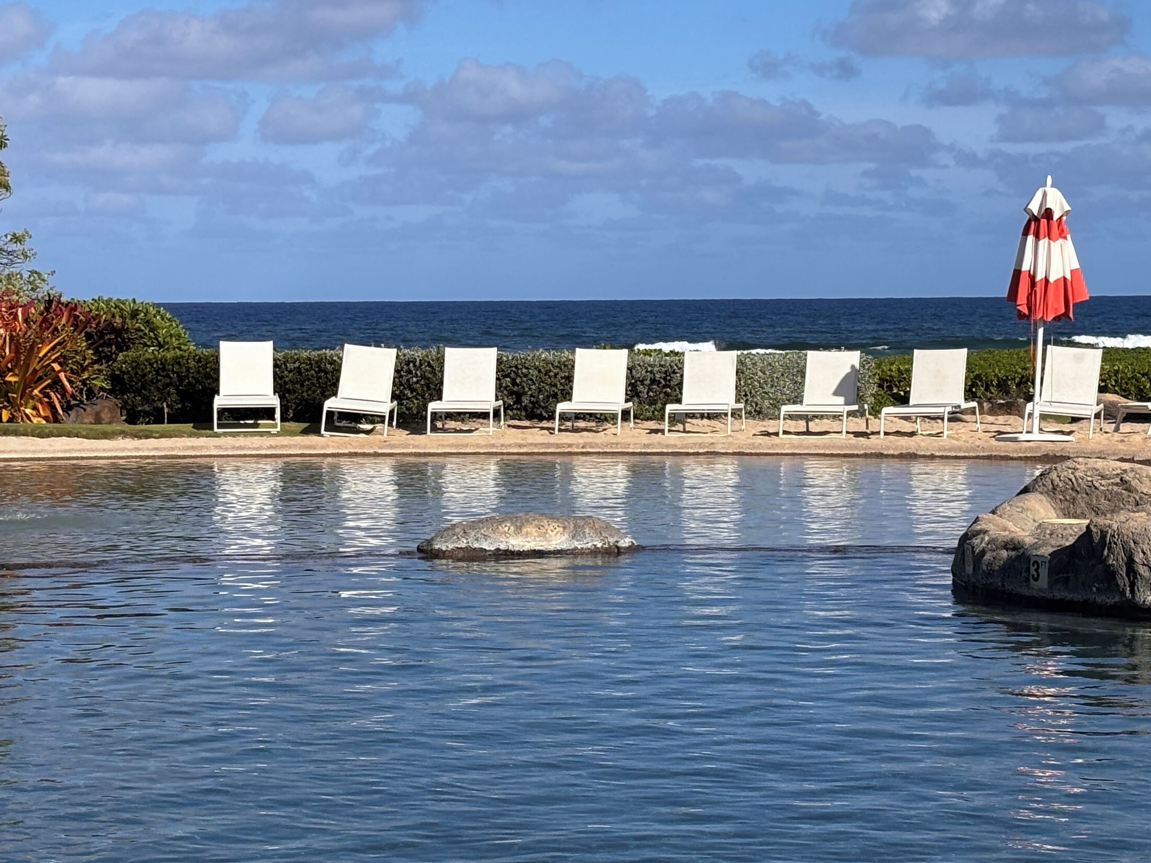 On the beach, sun loungers, beach towels