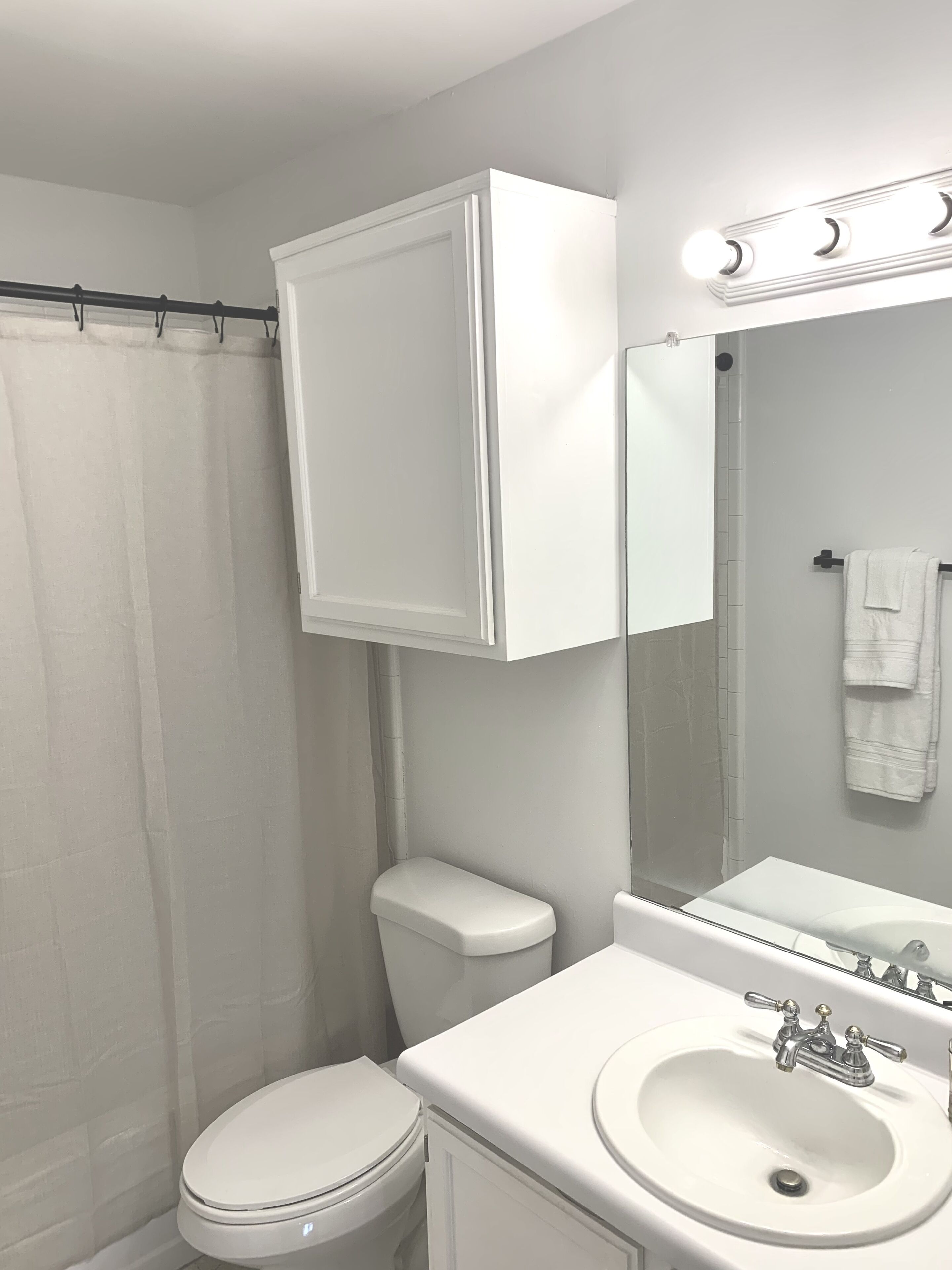 Combined shower/tub, hair dryer, towels, soap