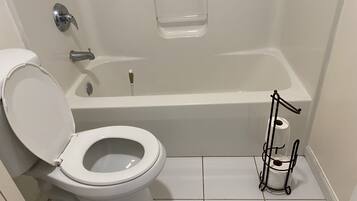 Combined shower/bathtub, soap, toilet paper