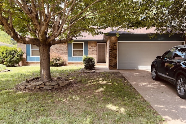 Beautiful quiet residential street with trees and sidewalks
