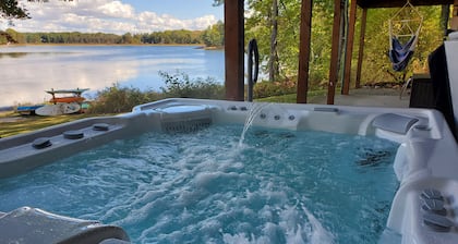 Tranquil Lakefront Log Cabin with Breathtaking Views.