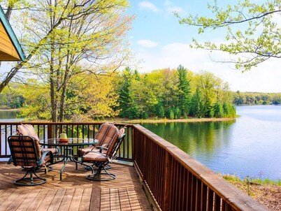 Tranquil Lakefront Log Cabin with Breathtaking Views.