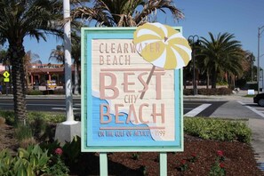 A sign for Clearwater Beach, labeled as the 'Best City Beach on the Gulf of Mexico - 1999.'