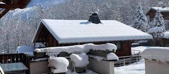 chalet 4*SPA TOUT CONFORT lit fait serviette de bain vue sur toute la chaine  
