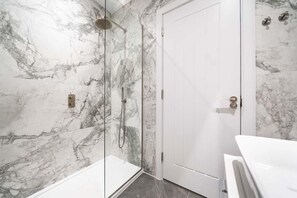 Combined shower/tub, hair dryer