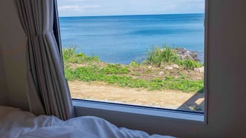 Standard Cabin | Down comforters, blackout drapes, free WiFi