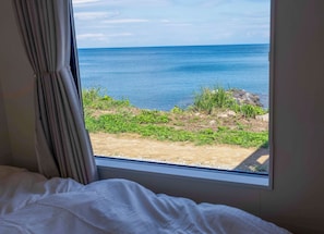 Standard Cabin | Down comforters, blackout drapes, free WiFi