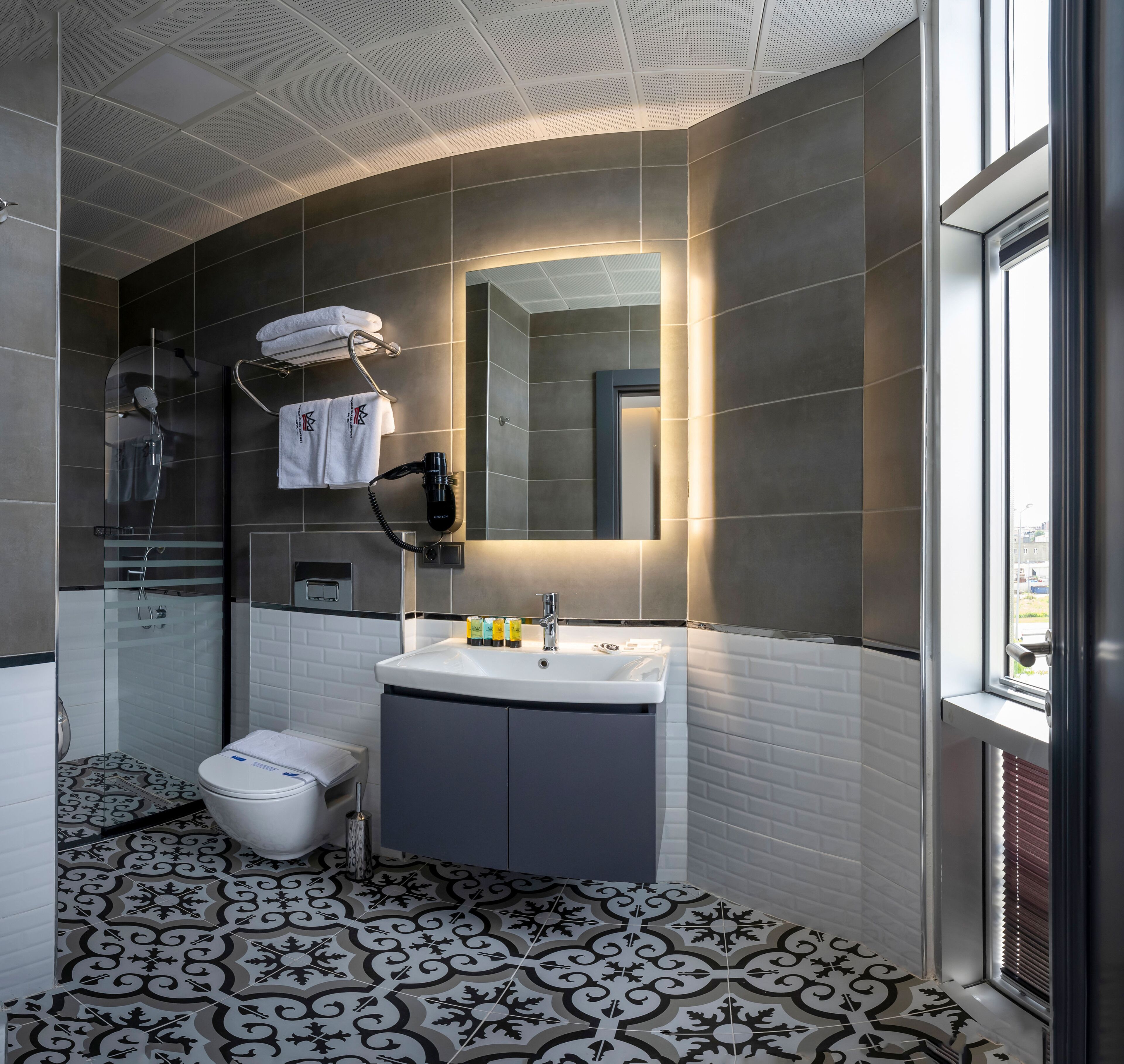 shower, hair dryer, bidet, heated floors