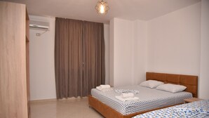 Family Apartment, 1 Bedroom | 1 bedroom, WiFi (free), bed sheets