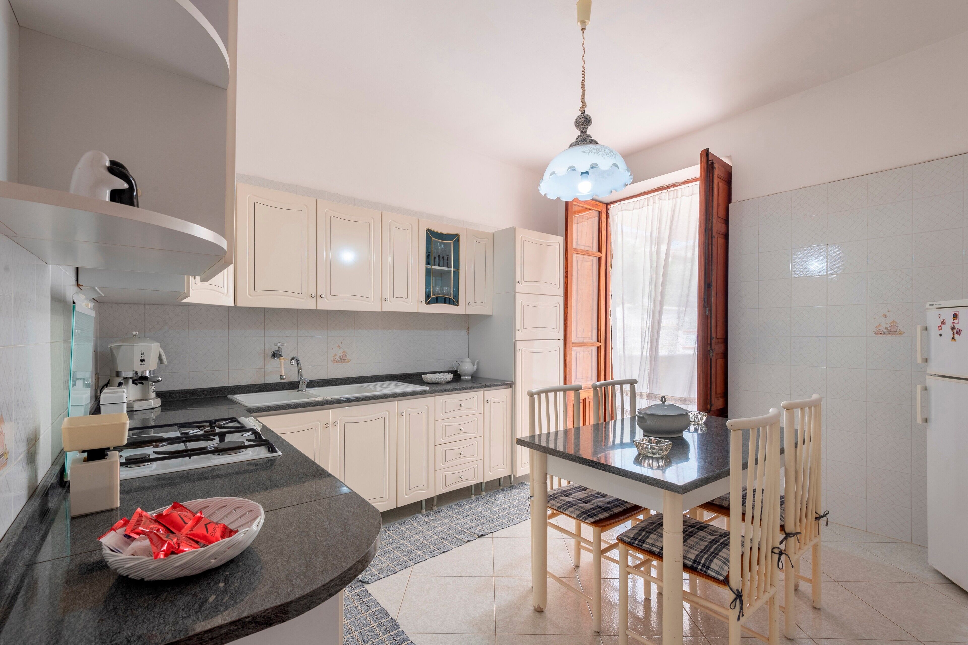 Fridge, stovetop, coffee/tea maker, cookware/dishes/utensils