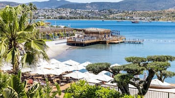 Private beach, white sand, free beach shuttle, sun loungers