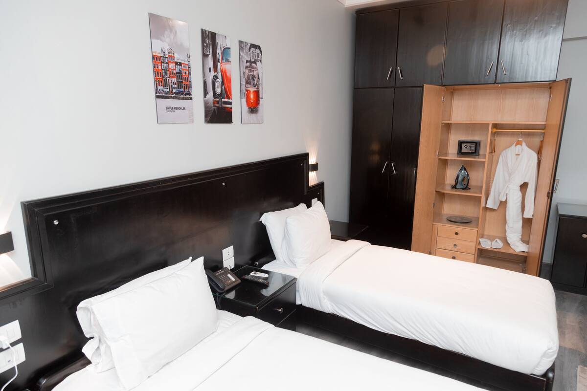 Habitación ejecutiva con 1 cama matrimonial o 2 individuales | Sábanas de algodón egipcio y ropa de cama de alta calidad