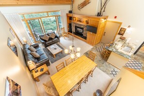 TV, fireplace, books, stereo - Tucked Away Condo w/ Large Balcony & Mountain Views, Short Drive to Keystone! (Keystone)