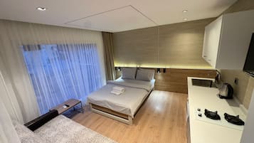 Casa superior | Escritorio, wifi gratis, ropa de cama