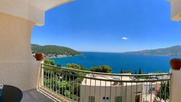 Panoramic Quadruple Room, Sea View | Balcony