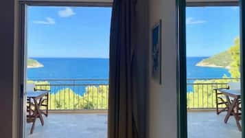 Quarto quádruplo panorâmico, vista para o mar | Terraço/pátio