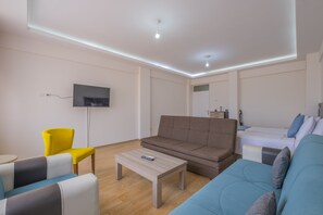 Apartamento urbano | Área de estar | TV
