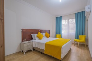 City Apartment | 2 bedrooms, in-room safe, iron/ironing board, travel cot