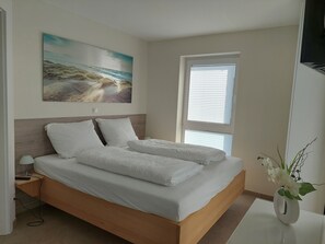 2 bedrooms, in-room safe, iron/ironing board, travel cot