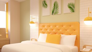 A modern bedroom with a large bed, a headboard, and a nightstand. - Bloom Hotel - Gachibowli (Hyderabad)