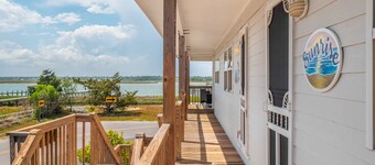 Sunrise | Covered Porch + Walk to the Beach!