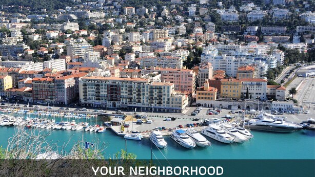 A coastal cityscape with residential buildings, a marina with yachts, and a clear view of the harbor. - N&J - L'ANCRE - Port district - Close Old Town (Niza)
