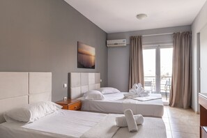 Kamar Triple Klasik | Wi-Fi gratis dan seprai linen