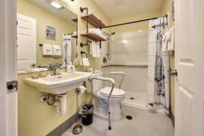 Shower, hair dryer, towels, shampoo