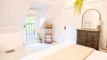 1 bedroom, desk, iron/ironing board, travel crib