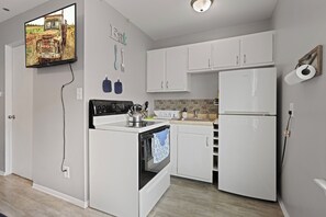 Fridge, microwave, stovetop, coffee/tea maker