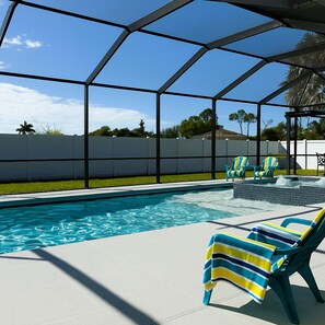 Outdoor pool, a heated pool - Luxury Pool & Spa! Sunny Cape Coral Getaway (Cape Coral)