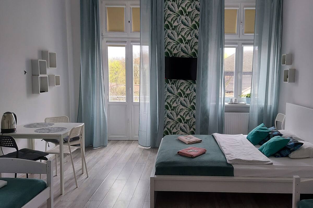 Basic Quadruple Room | Blackout drapes, iron/ironing board (on request), WiFi (free)