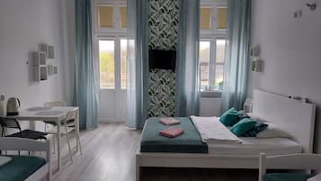 Blackout curtains, iron/ironing board, free WiFi, bed sheets