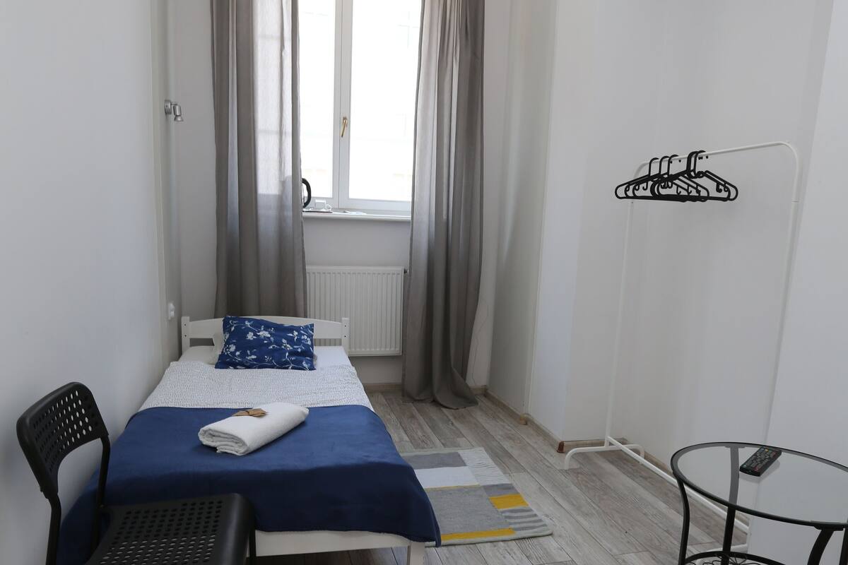 Basic Single Room | Blackout drapes, iron/ironing board (on request), WiFi (free)