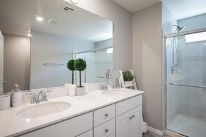 Bathtub, hair dryer, towels, soap