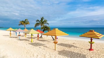On the beach, sun loungers, beach towels