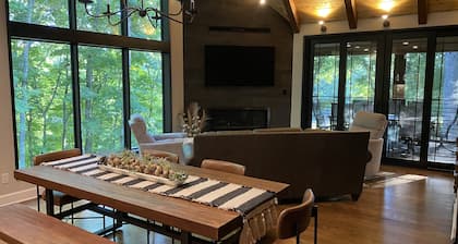 Modern/rustic chalet nestled in the woods at Paradise Ranch & Retreat