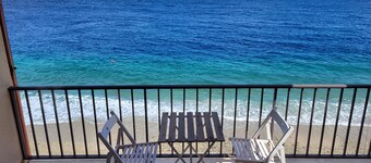 Beach house over the sand with an amazing view of Sicily