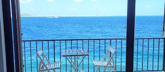 Beach house over the sand with an amazing view of Sicily