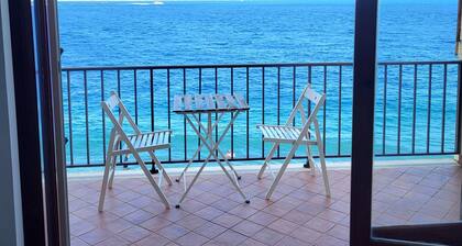 Beach house over the sand with an amazing view of Sicily