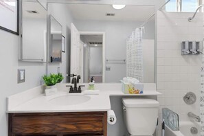 Shower, hair dryer, shampoo