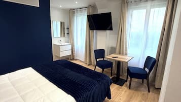 Chambre Signature Double ou avec lits jumeaux, vue jardin | Literie de qualité supérieure, matelas mémoire de forme